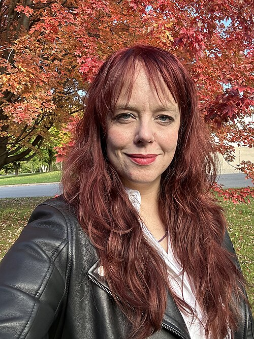 Melissa F. Olson